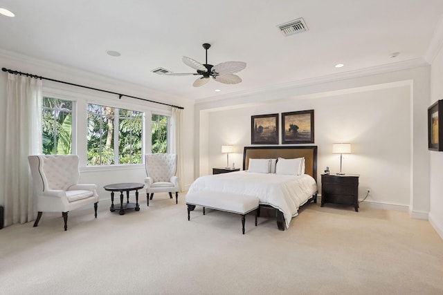 bedroom featuring ceiling fan, light colored carpet, and ornamental molding