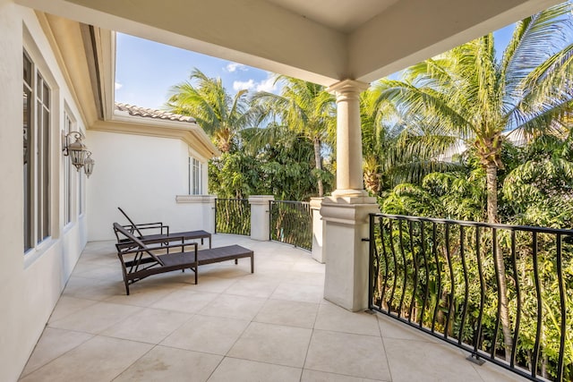 view of patio with a balcony