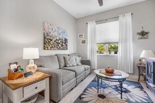 living room featuring ceiling fan and light tile patterned flooring