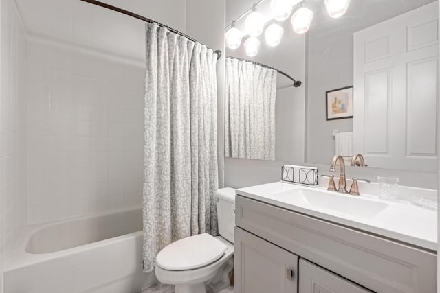 full bathroom with shower / bath combo, toilet, and vanity