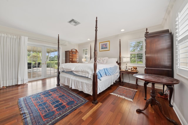 bedroom with hardwood / wood-style flooring, access to exterior, ornamental molding, and french doors