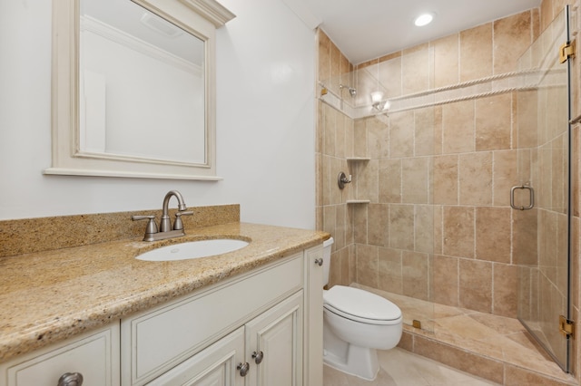 bathroom featuring toilet, vanity, tile patterned floors, and walk in shower