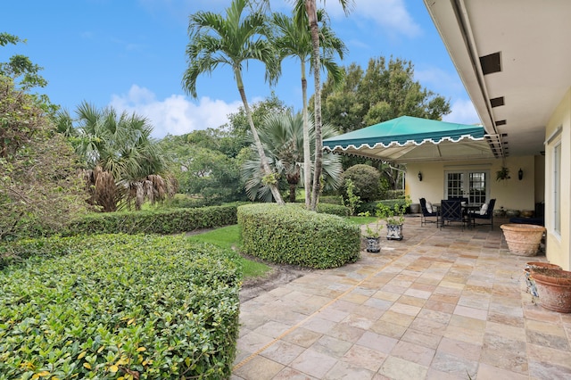 view of patio featuring french doors