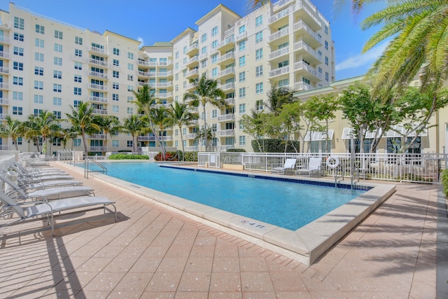 view of pool featuring a patio