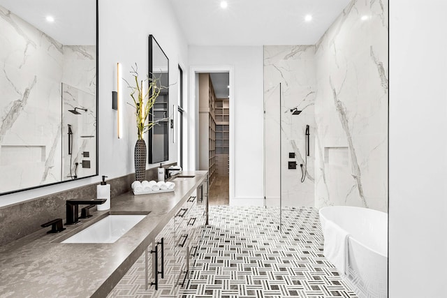 bathroom featuring vanity and separate shower and tub