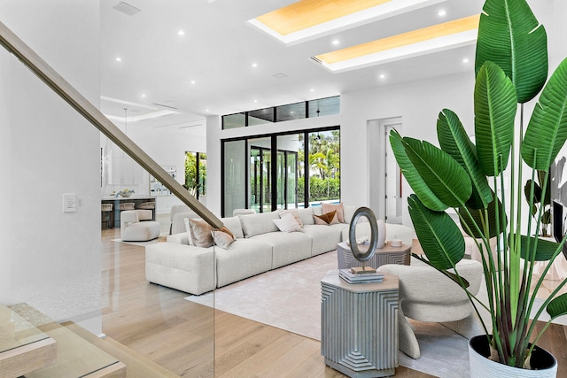 living room with light hardwood / wood-style floors