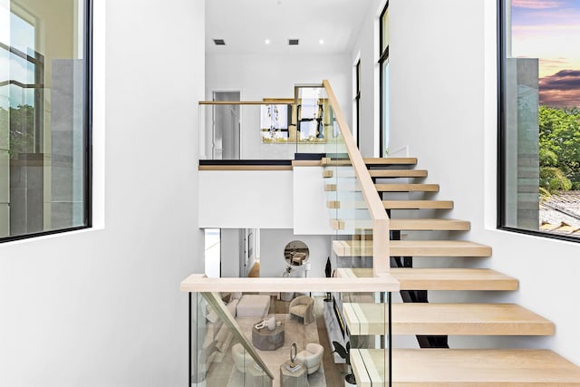 stairs featuring a wealth of natural light