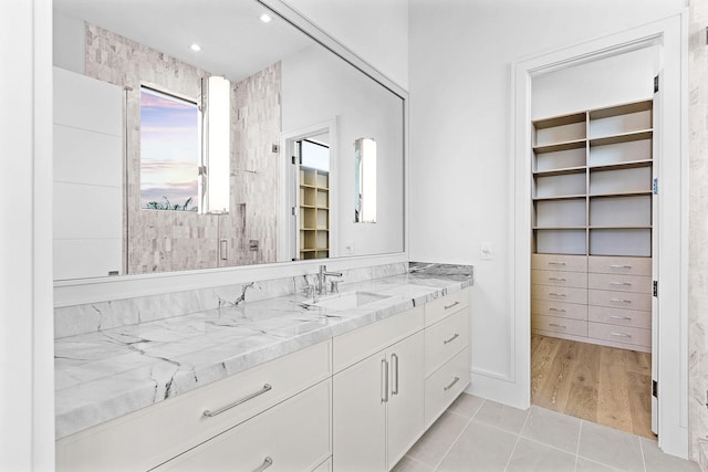 bathroom featuring hardwood / wood-style floors and vanity