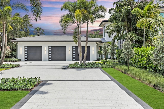 modern home featuring a garage