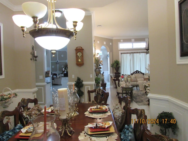 dining area featuring ornamental molding