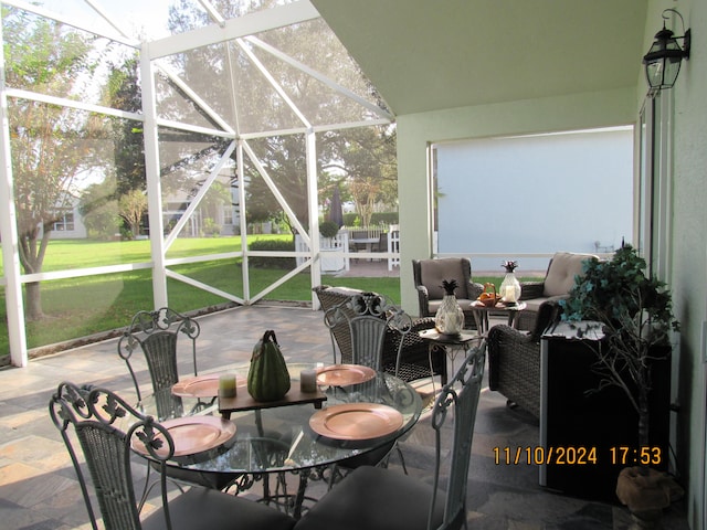 view of patio / terrace with glass enclosure