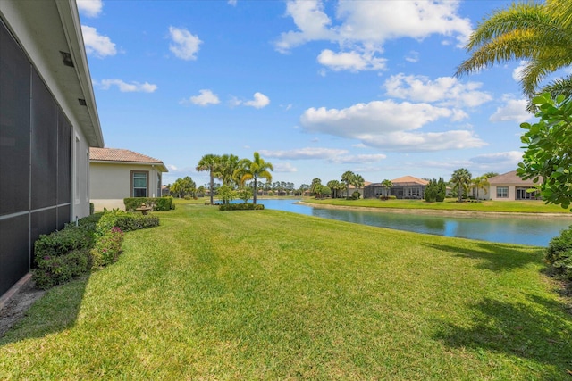 view of yard featuring a water view