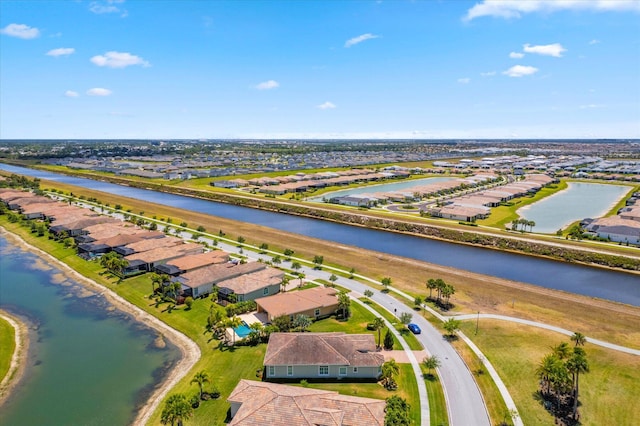 bird's eye view with a water view