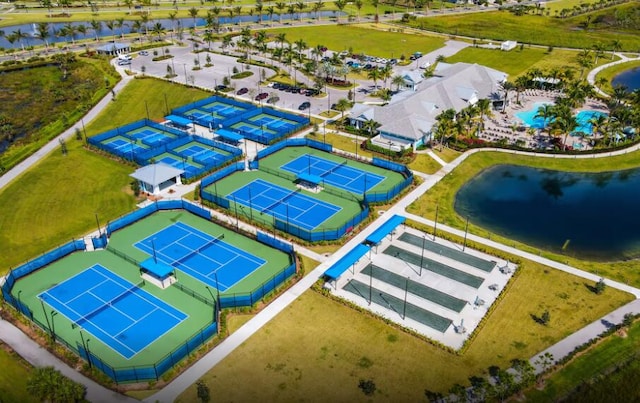 birds eye view of property with a water view