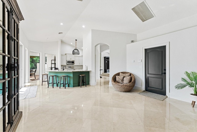 interior space with vaulted ceiling