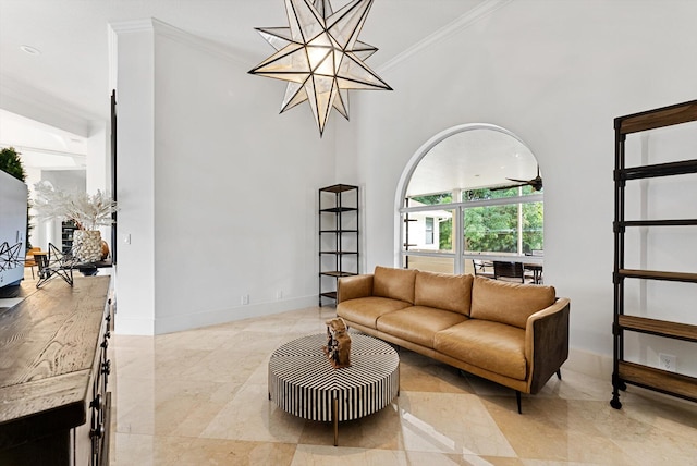 living room featuring crown molding