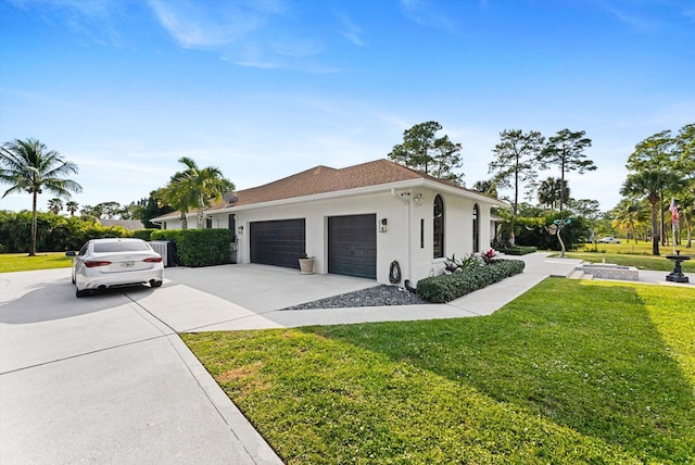 view of property exterior featuring a garage and a lawn