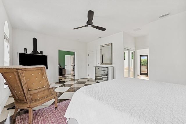 bedroom featuring connected bathroom and ceiling fan