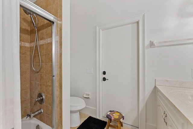 full bathroom with vanity, toilet, and tiled shower / bath