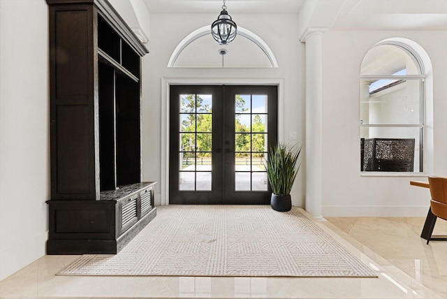 foyer entrance featuring french doors