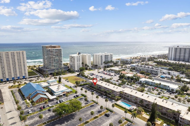 aerial view featuring a beach view and a water view