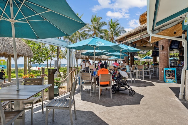 view of patio / terrace with a water view