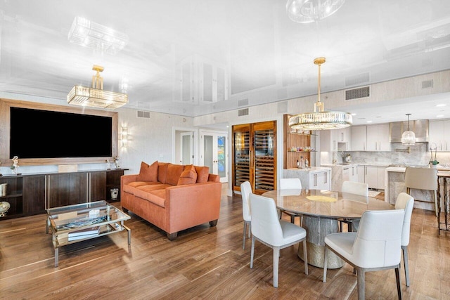 dining space with light hardwood / wood-style flooring