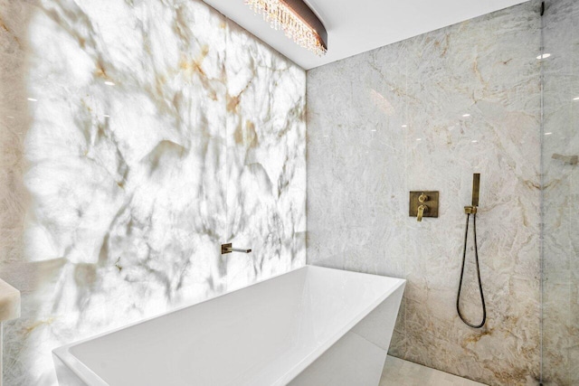 bathroom featuring tile walls