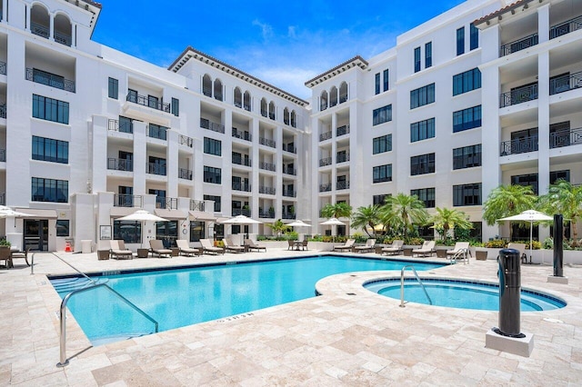 view of pool featuring a patio