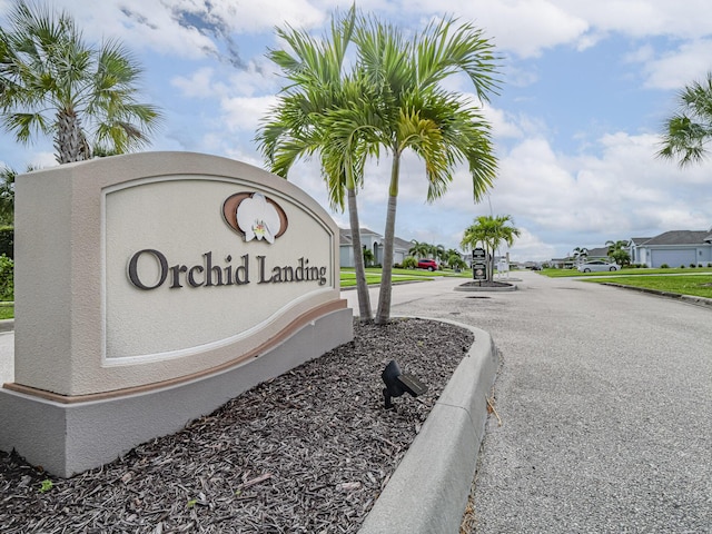 community sign featuring a residential view