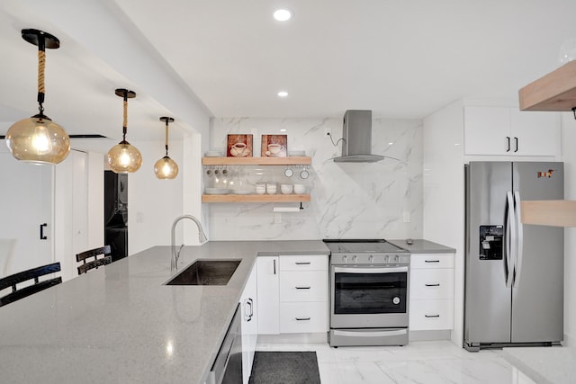 kitchen featuring white cabinets, sink, stainless steel appliances, and extractor fan