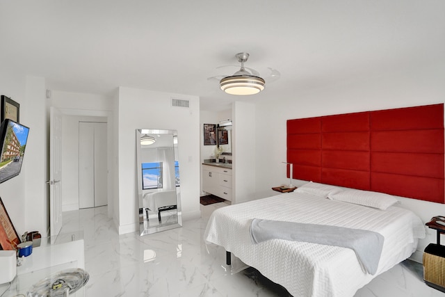 bedroom featuring ensuite bathroom