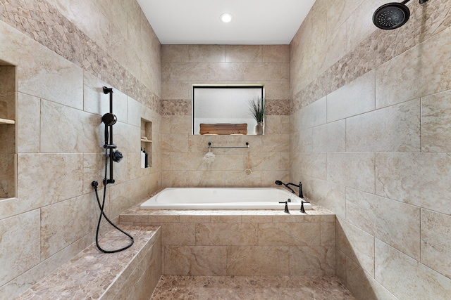 bathroom featuring separate shower and tub and tile walls