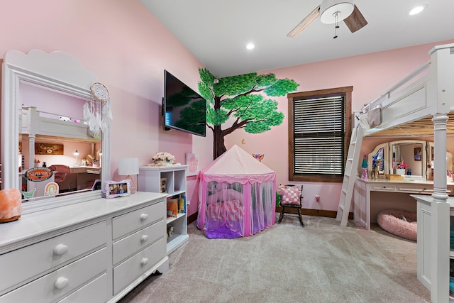 bedroom featuring light carpet and ceiling fan