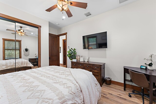 bedroom featuring light colored carpet