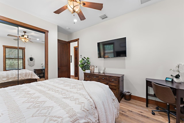 bedroom featuring light hardwood / wood-style flooring and ceiling fan