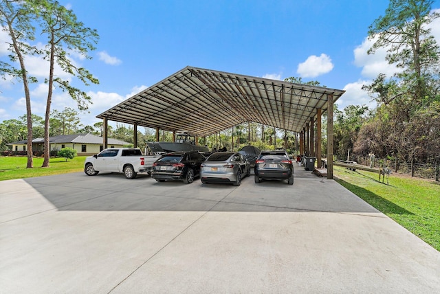 view of parking featuring a carport and a lawn