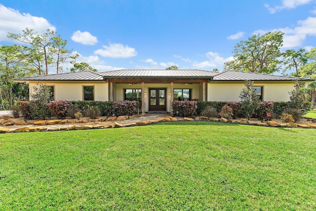 view of front of property with a front lawn