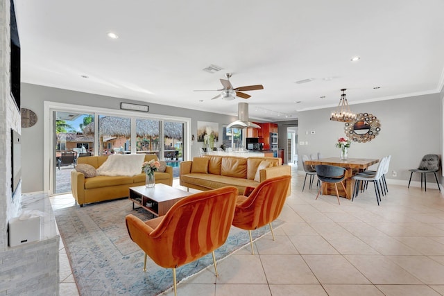 living room with ceiling fan, light tile patterned floors, and ornamental molding