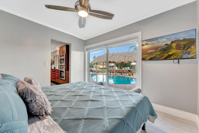 bedroom with ceiling fan, access to exterior, light wood-type flooring, and crown molding