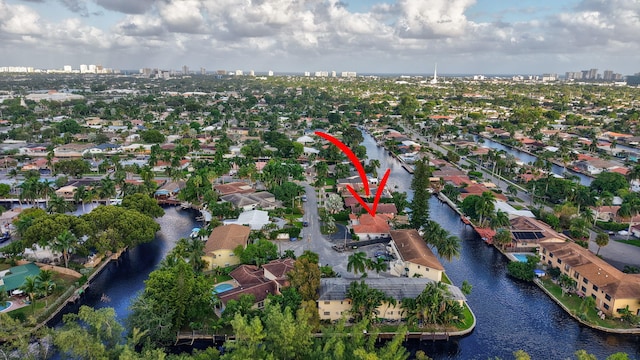 drone / aerial view with a water view