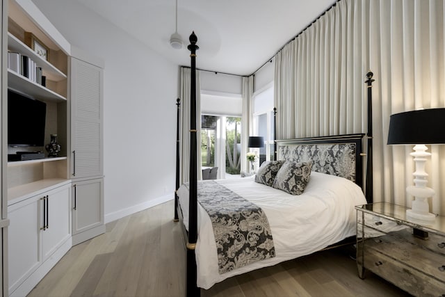 bedroom with light wood-type flooring