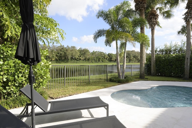 view of swimming pool featuring a patio