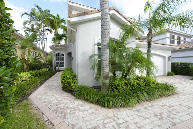 view of home's exterior with a garage