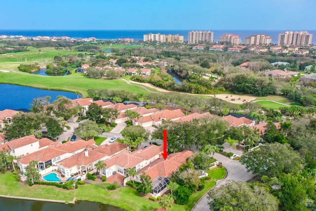 birds eye view of property featuring a water view