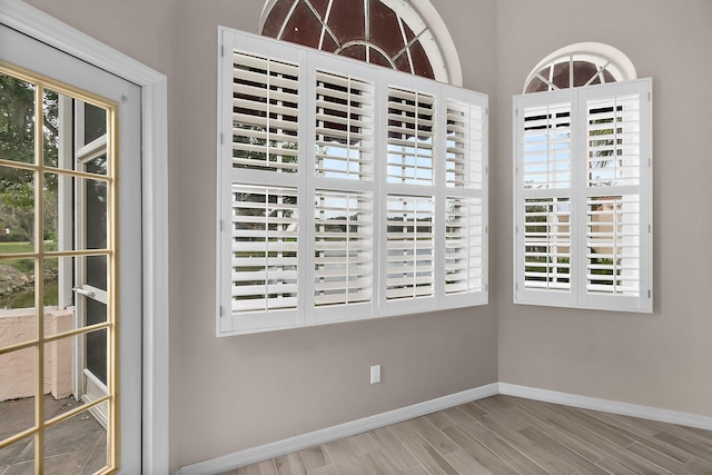 spare room featuring hardwood / wood-style flooring