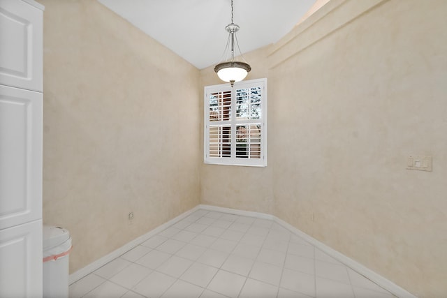 3 Via Capri, Capri, Palm Coast, FL 32137 - unfurnished room featuring baseboards and light tile patterned flooring
