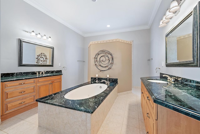 bathroom with tile patterned floors, vanity, crown molding, and tiled tub