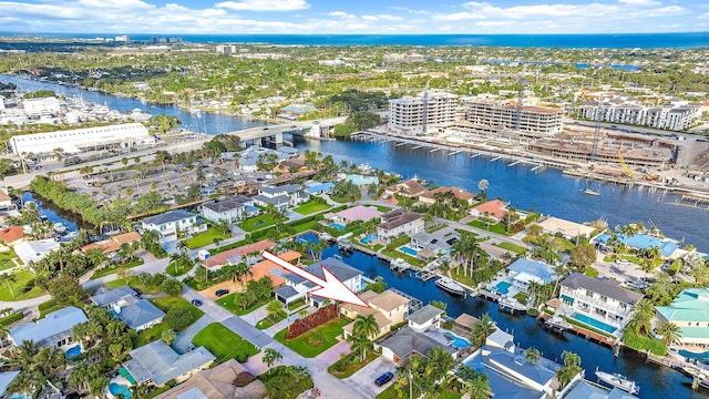 birds eye view of property featuring a water view