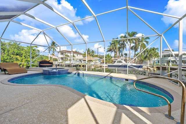 view of swimming pool featuring glass enclosure, an in ground hot tub, a water view, and a patio